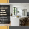 Lacquered glass kitchen cabinets in a modern white kitchen